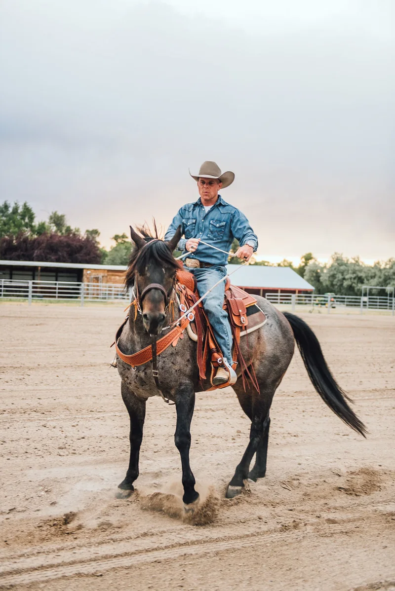 Bart on horseback in cowboy attire