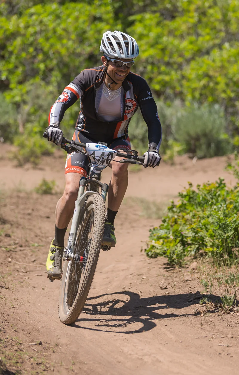Bart racing a mountain bike